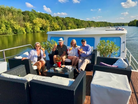 Guests enjoying cocktails on the Grand Victoria while cruising on the River Saône in Burgundy, France