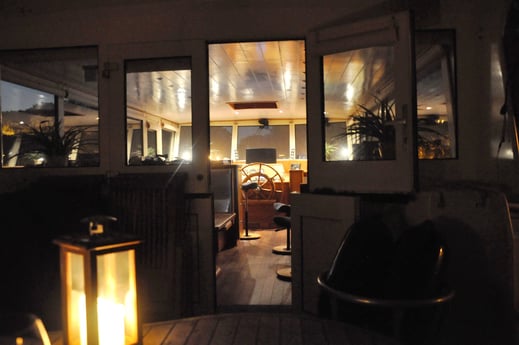 View into the wheelhouse from the aft deck.