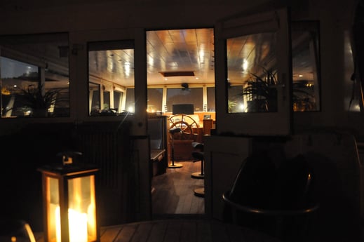 View from the aft deck into the wheelhouse.