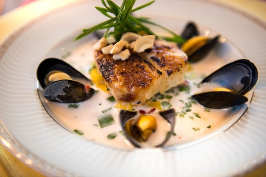 Sea bass and mussels in a curry cream sauce on the luxury yacht Grand Victoria