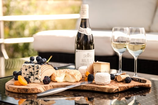 Happy hour on board the luxury yacht Grand Victoria with a selection of French cheeses
